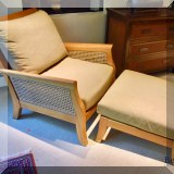 F42. Gloster “Anassa” indoor outdoor wicker chair and ottoman. 34”h x 34”d 